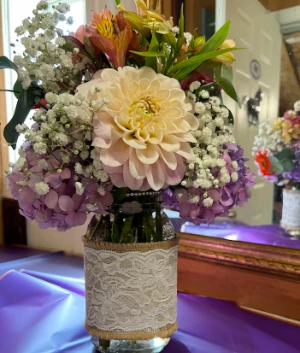 free burlap / lace vase with every bouquet purchase, while supplies last